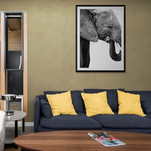 Elephant Eating Photography Print in black frame with mount