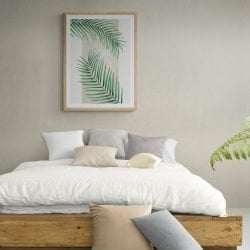 Minimalist Palm Leaf Print in a natural wood frame with mount